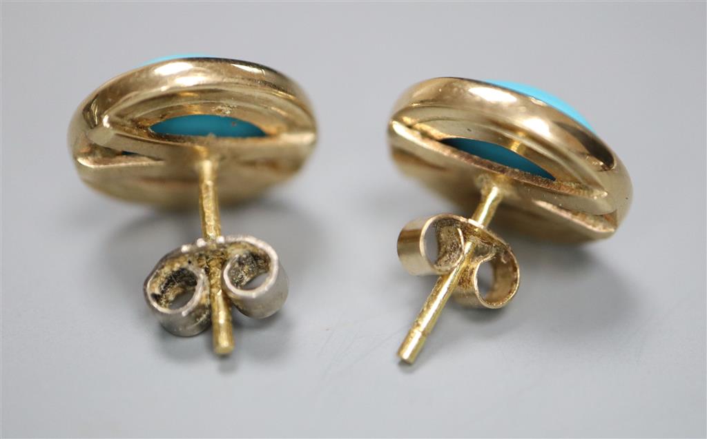 A pair of modern 9ct gold and cabochon turquoise set oval earrings ( one stone a.f., 12mm, gross 5.5 grams.